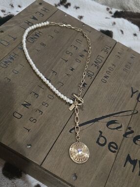 Gold and White Pearl Toggle Necklace with Sunburst Pendant